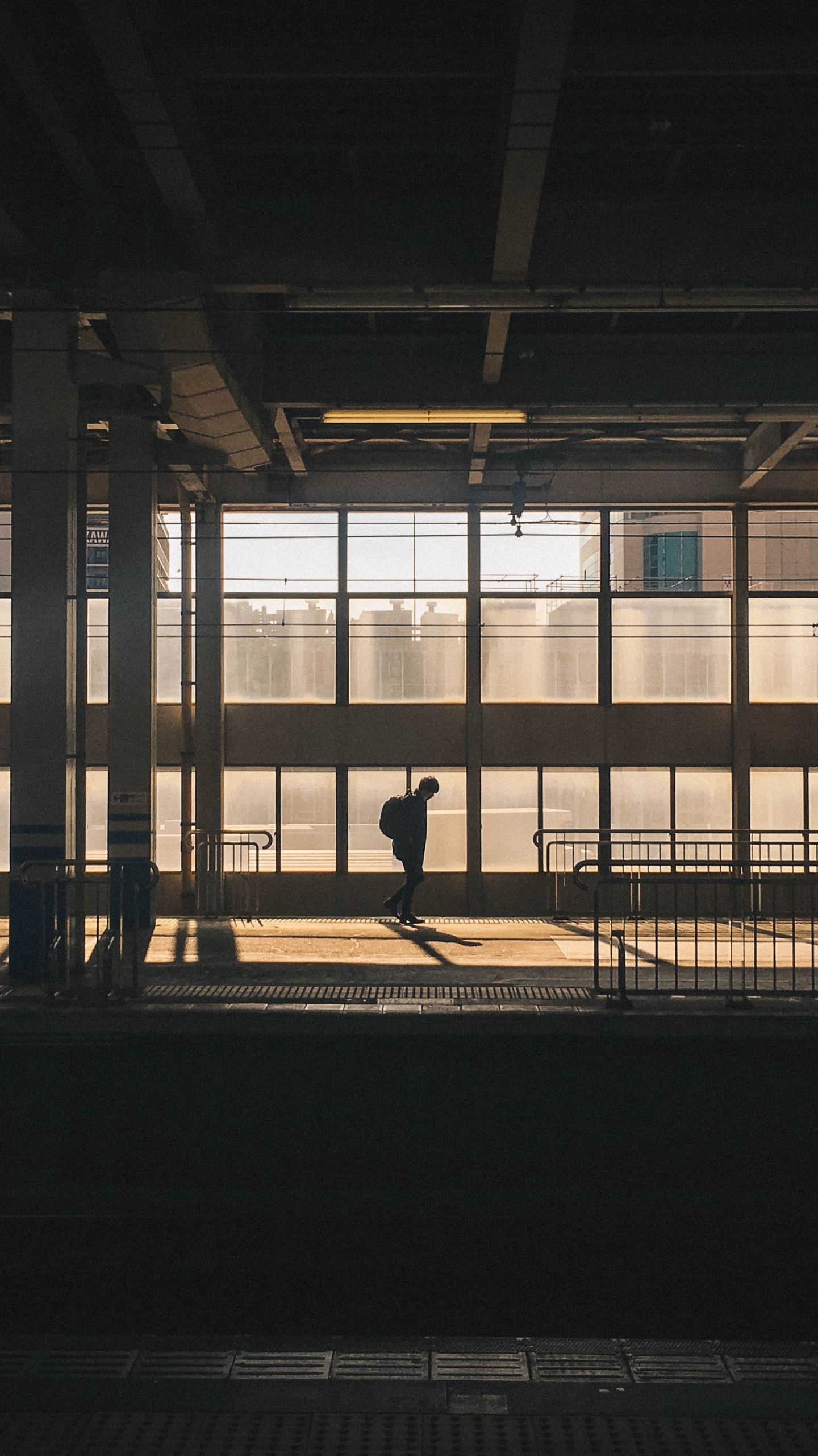Silhouette of Person Walking on Sidewalk During Daytime. Wallpaper in 1440x2560 Resolution
