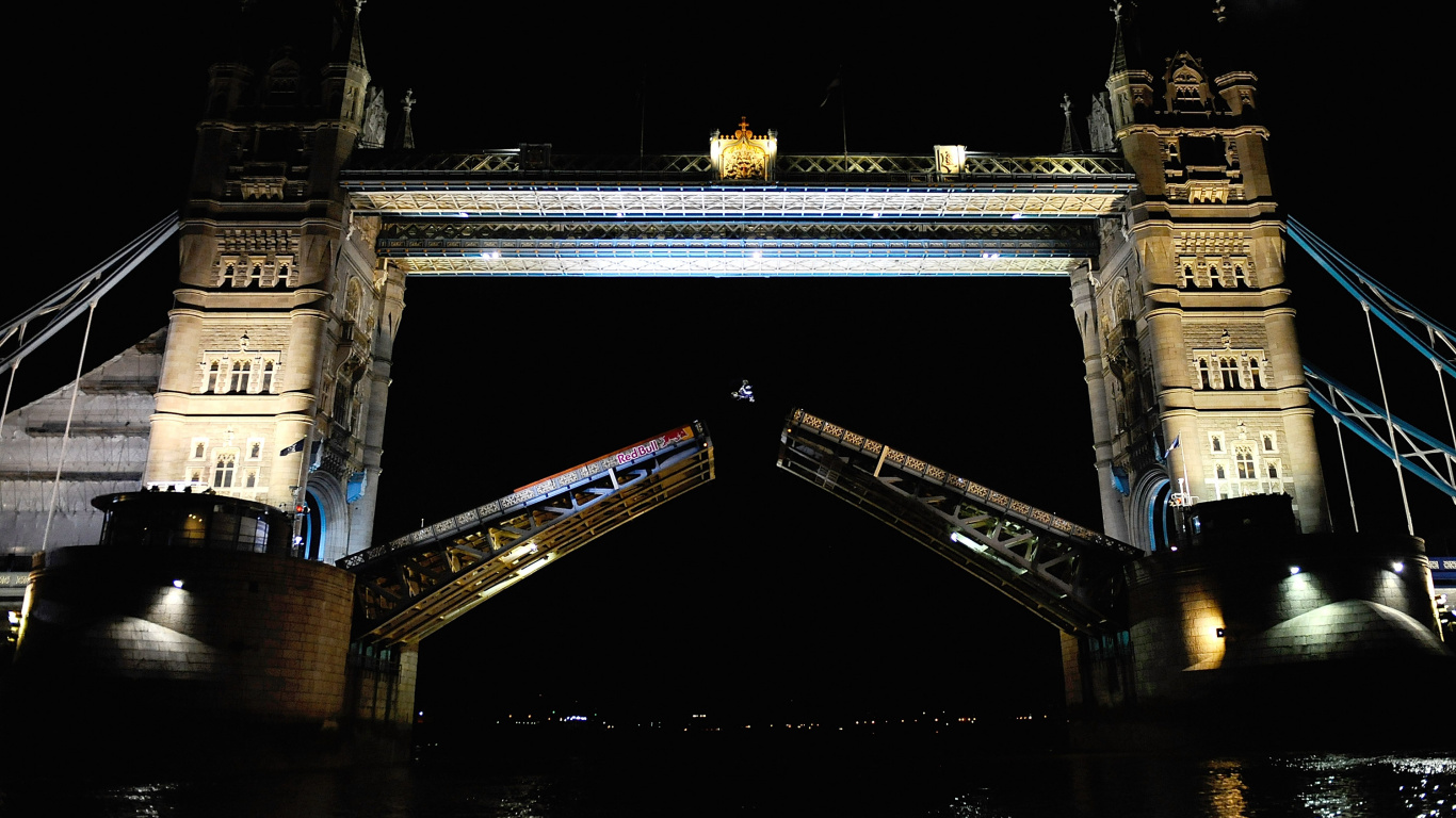 White and Brown Concrete Bridge During Night Time. Wallpaper in 1366x768 Resolution