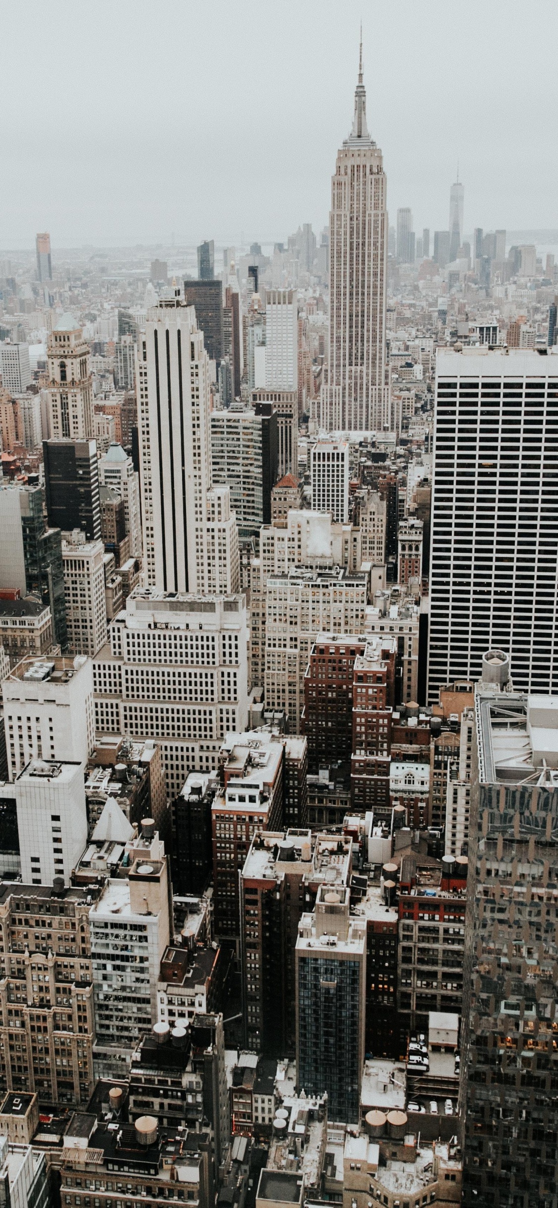 Aerial View of City Buildings During Daytime. Wallpaper in 1125x2436 Resolution