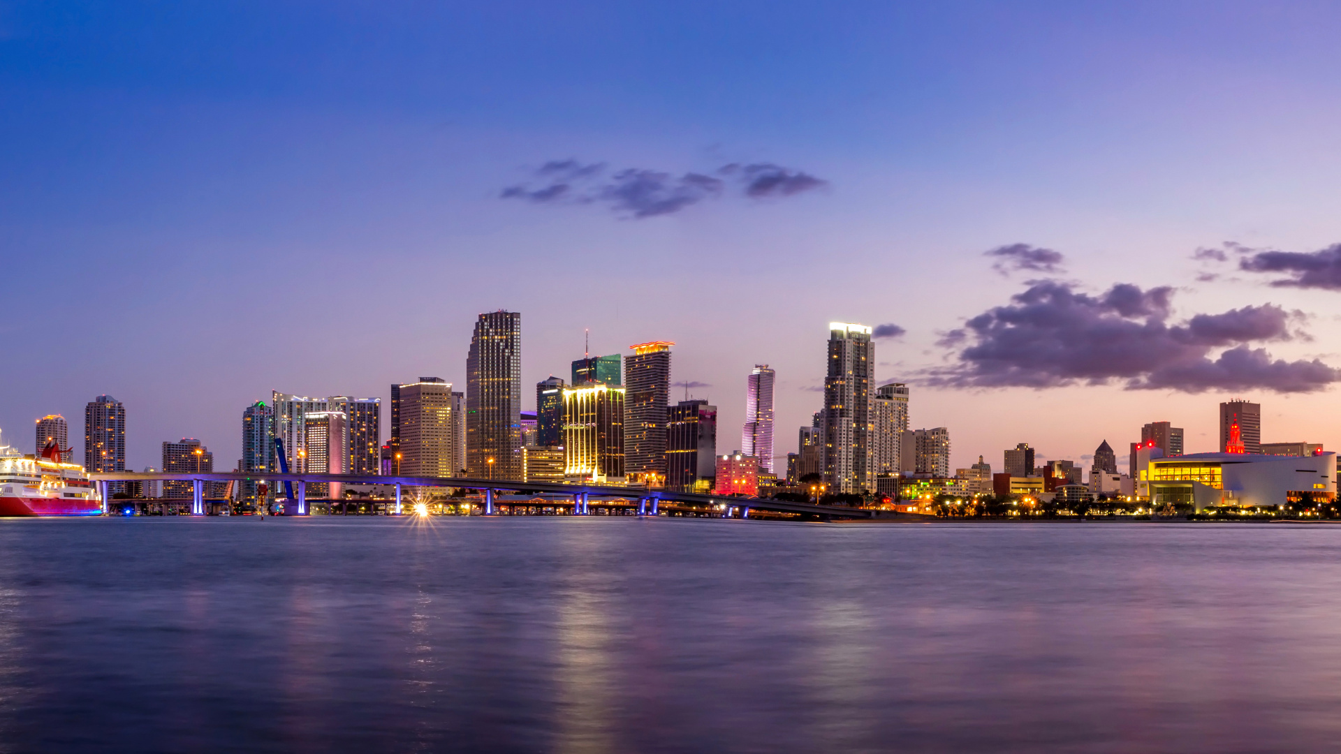 City Skyline Across Body of Water During Night Time. Wallpaper in 1920x1080 Resolution