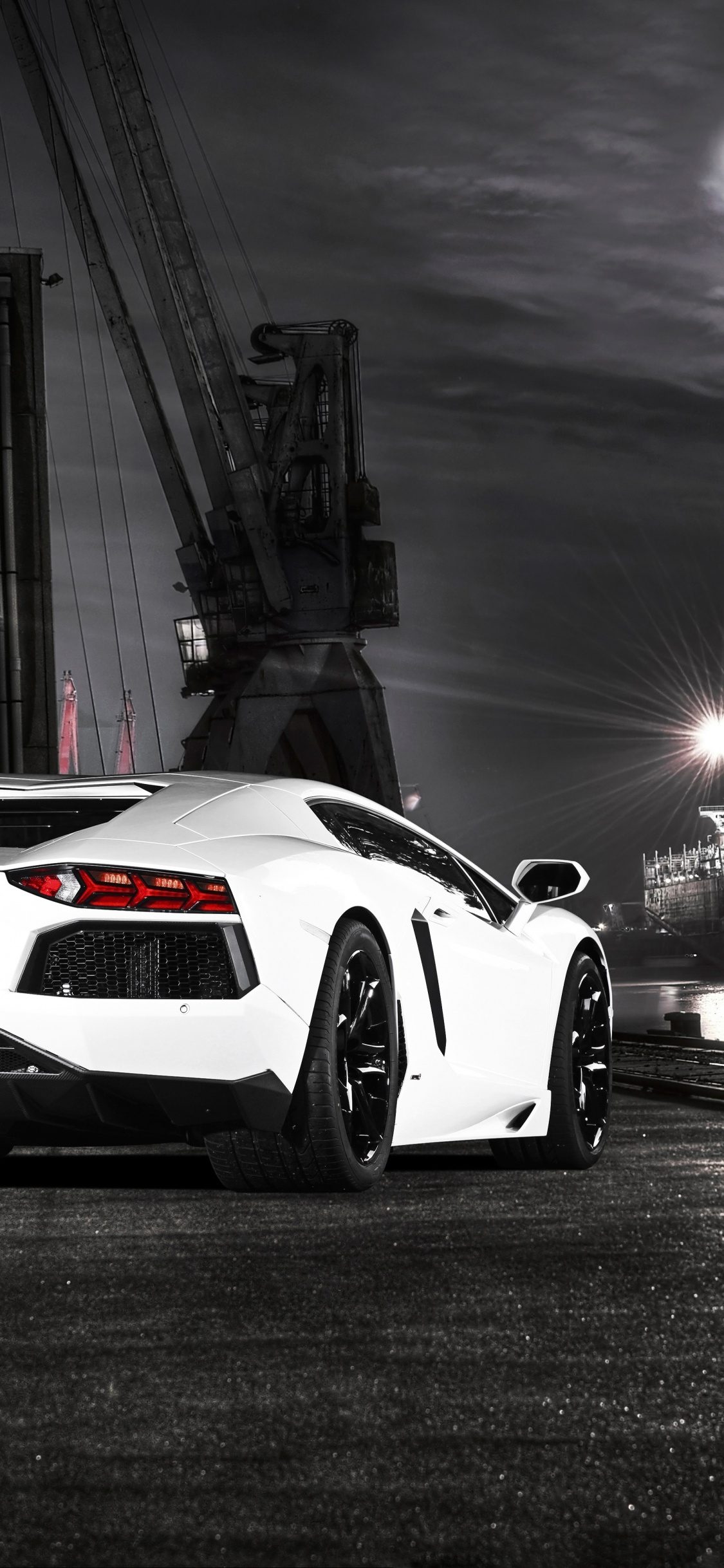 White Porsche 911 on Road During Night Time. Wallpaper in 1125x2436 Resolution