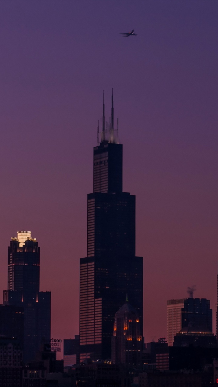 Silhouette of High Rise Buildings During Sunset. Wallpaper in 720x1280 Resolution