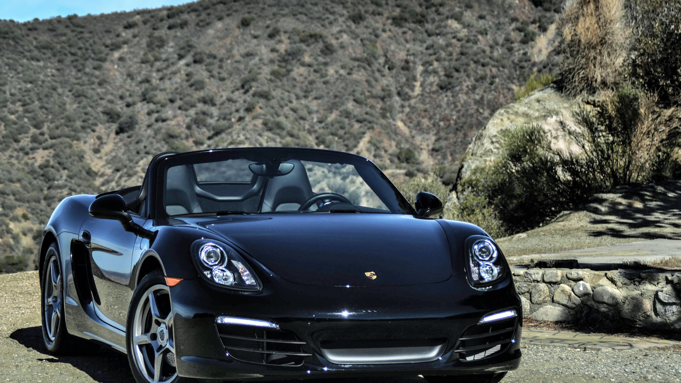 Black Porsche 911 on Brown Dirt Road During Daytime. Wallpaper in 1366x768 Resolution