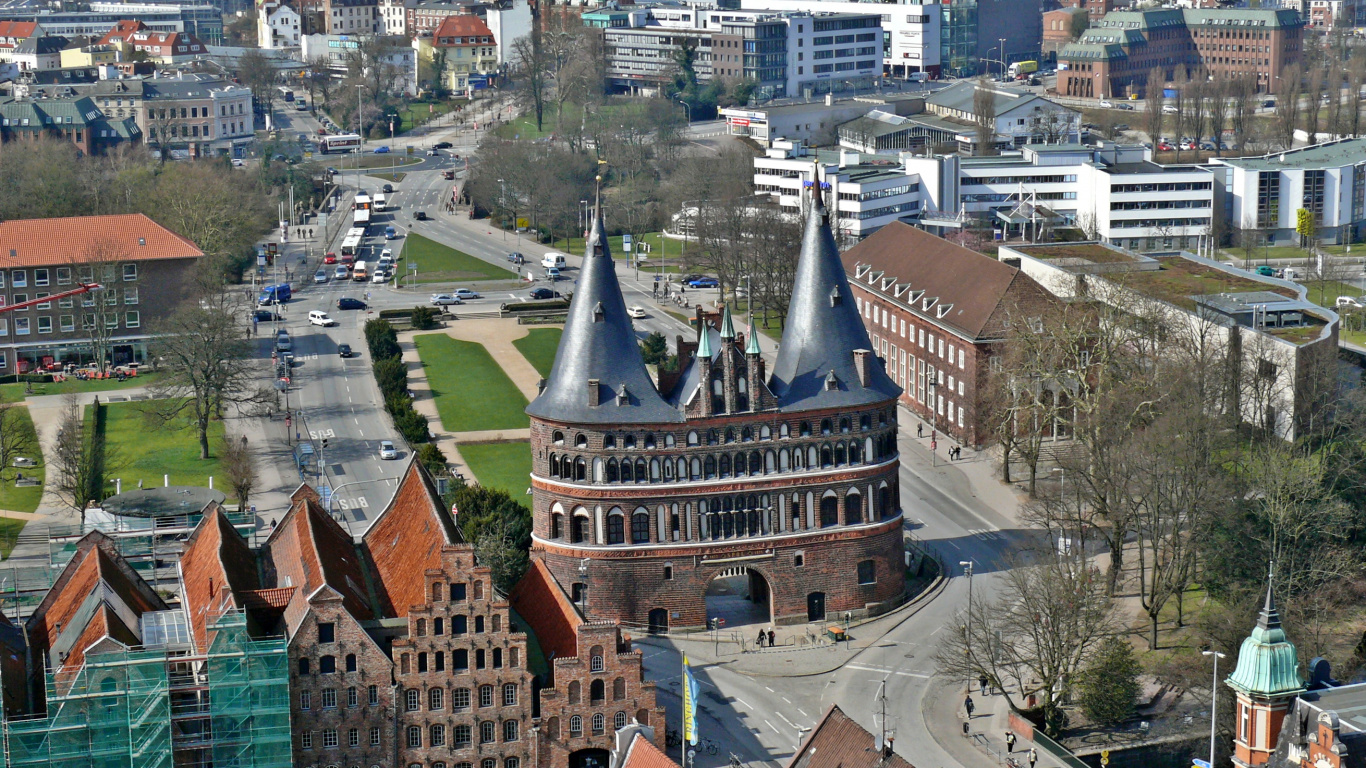Aerial View of Brown and White Concrete Building During Daytime. Wallpaper in 1366x768 Resolution