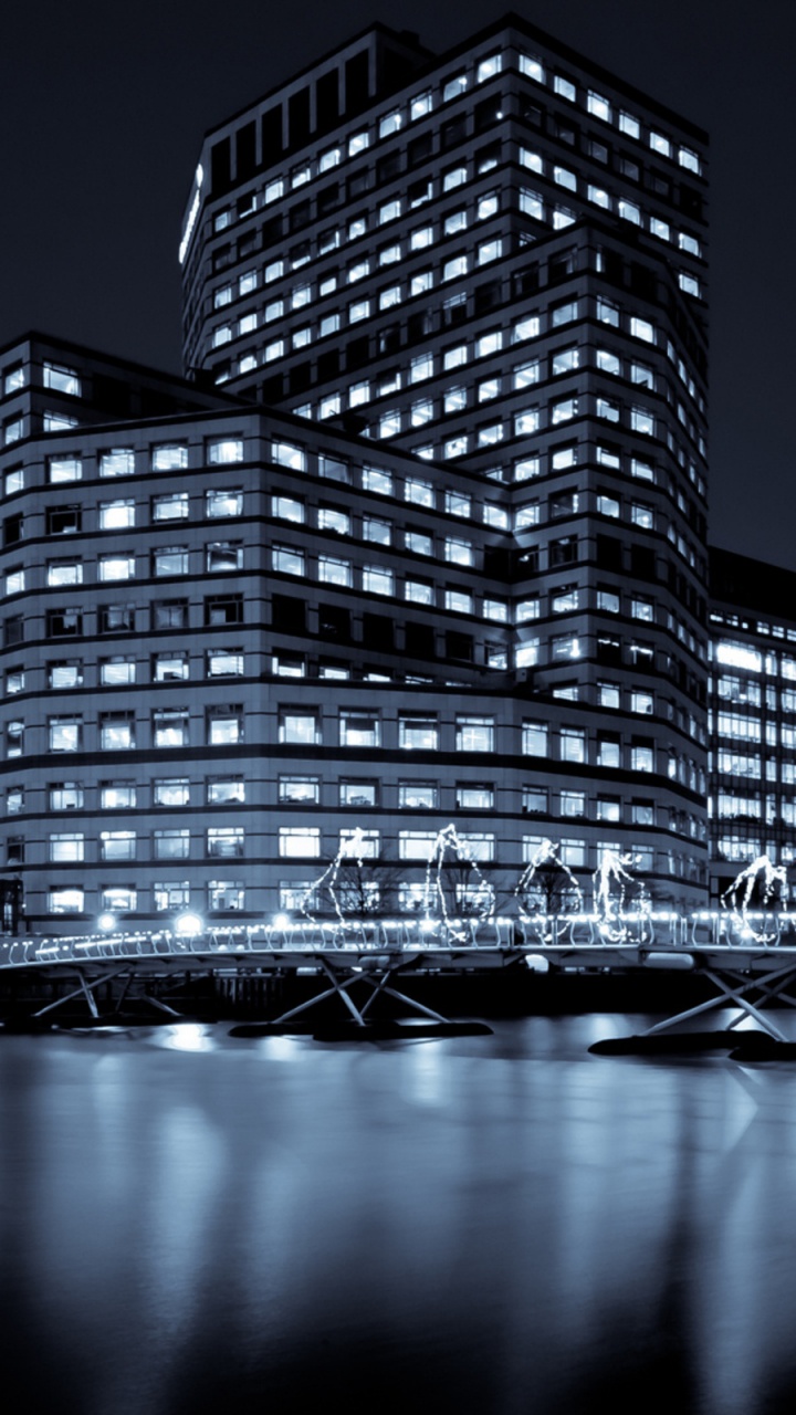 Lighted High Rise Building During Night Time. Wallpaper in 720x1280 Resolution