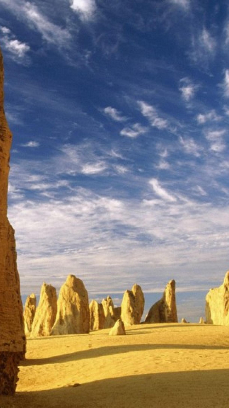 Brown Rock Formation Under Blue Sky During Daytime. Wallpaper in 750x1334 Resolution