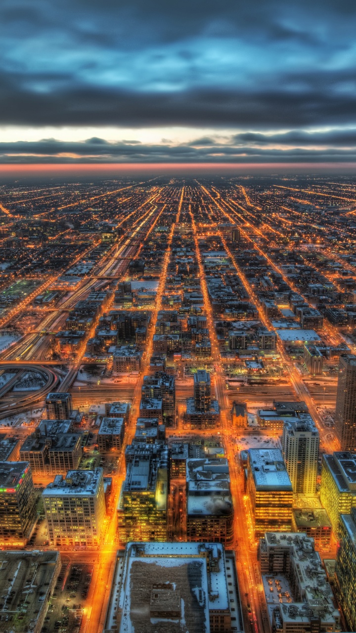 Vue Aérienne Des Bâtiments de la Ville Pendant la Nuit. Wallpaper in 720x1280 Resolution