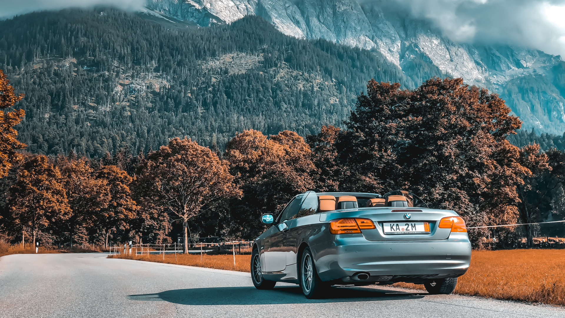 Silver Sedan on Gray Asphalt Road During Daytime. Wallpaper in 1920x1080 Resolution