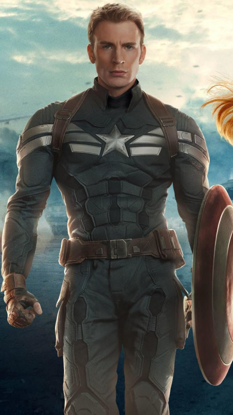 Hombre y Mujer en Traje Negro y Marrón de Pie en la Orilla de la Playa. Wallpaper in 750x1334 Resolution