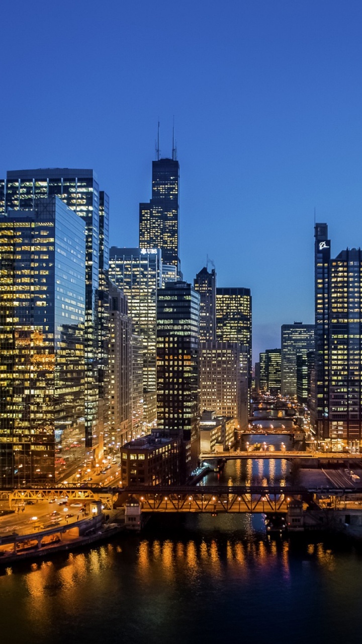 City Skyline During Night Time. Wallpaper in 720x1280 Resolution