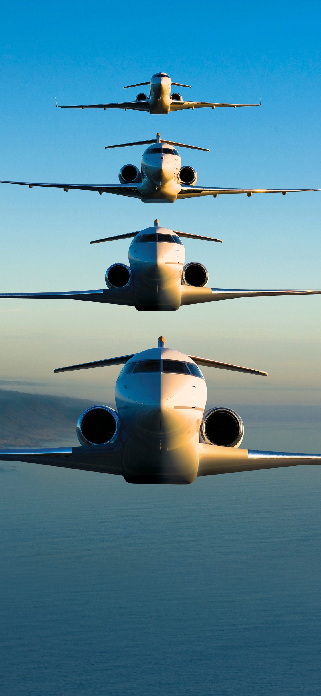 Éoliennes au Sommet de la Montagne Pendant la Journée. Wallpaper in 1125x2436 Resolution