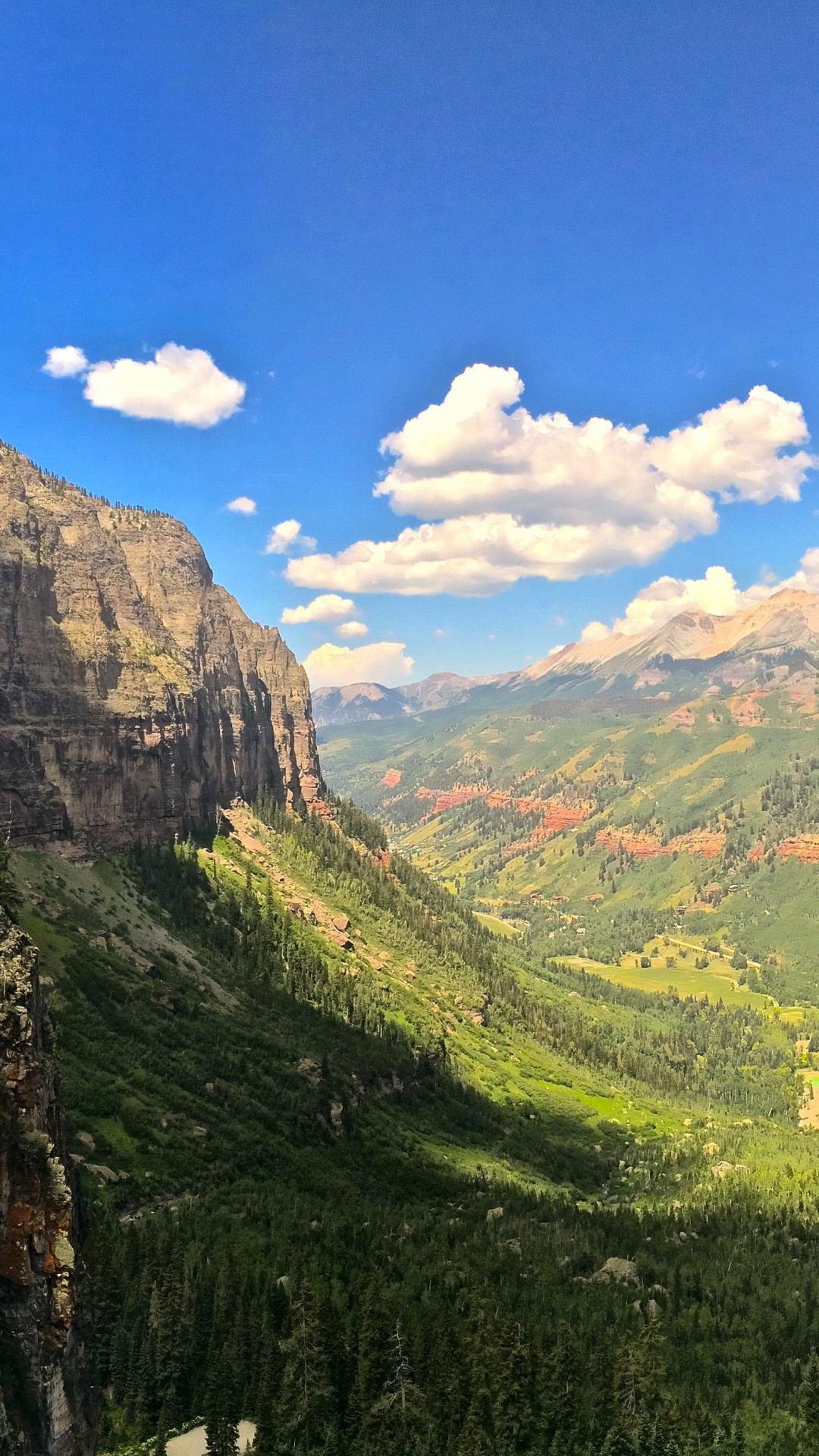 Green Mountains Under Blue Sky During Daytime. Wallpaper in 1080x1920 Resolution