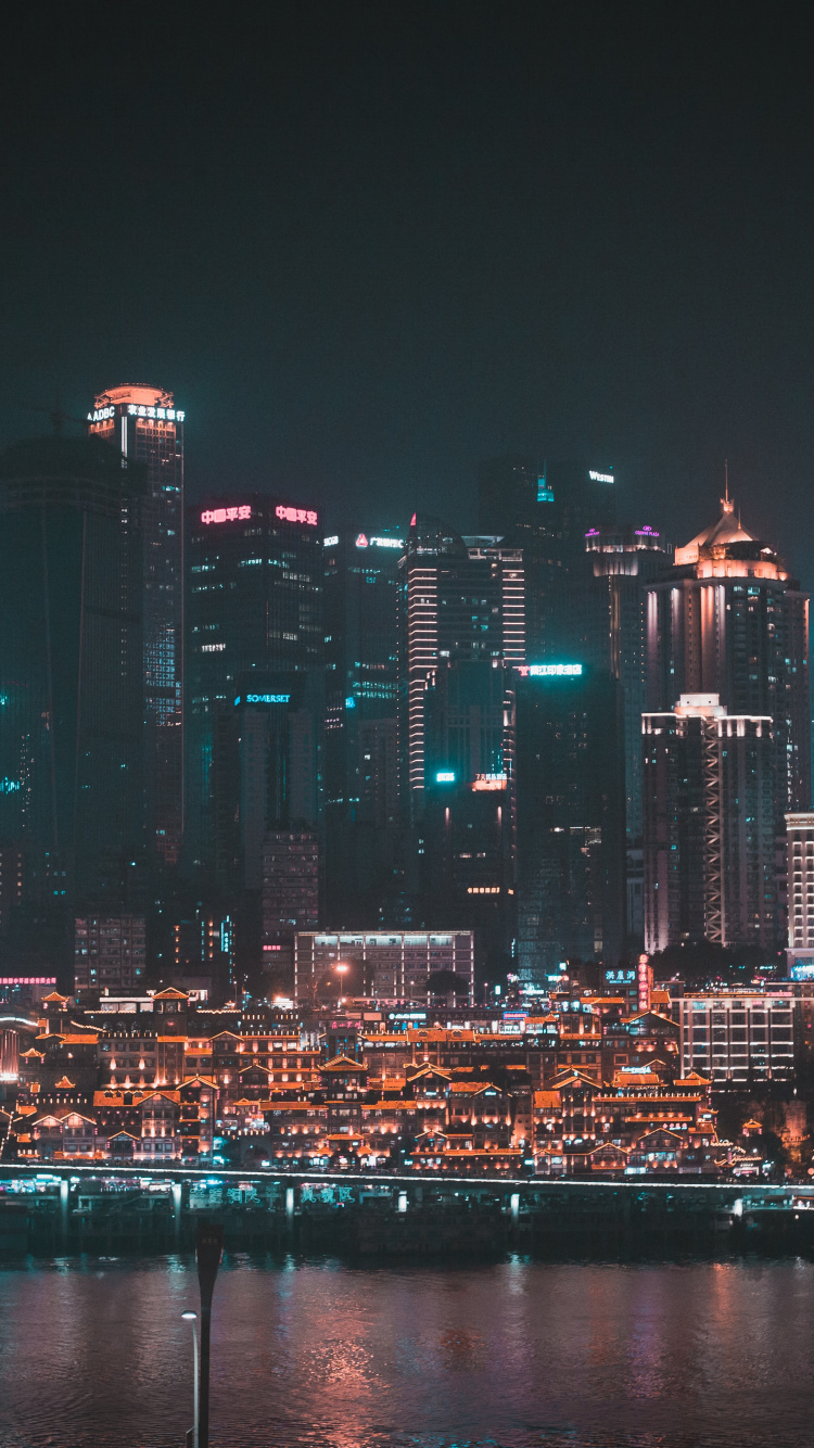 City Skyline During Night Time. Wallpaper in 750x1334 Resolution