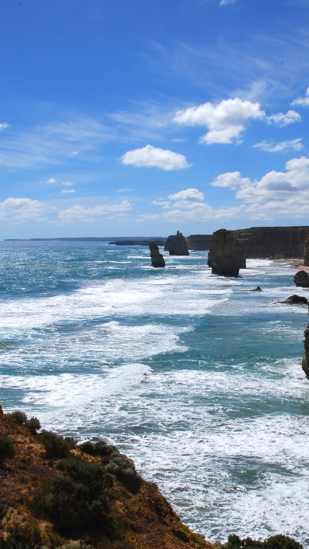 Brown Rock Formation on Sea Shore During Daytime. Wallpaper in 1080x1920 Resolution