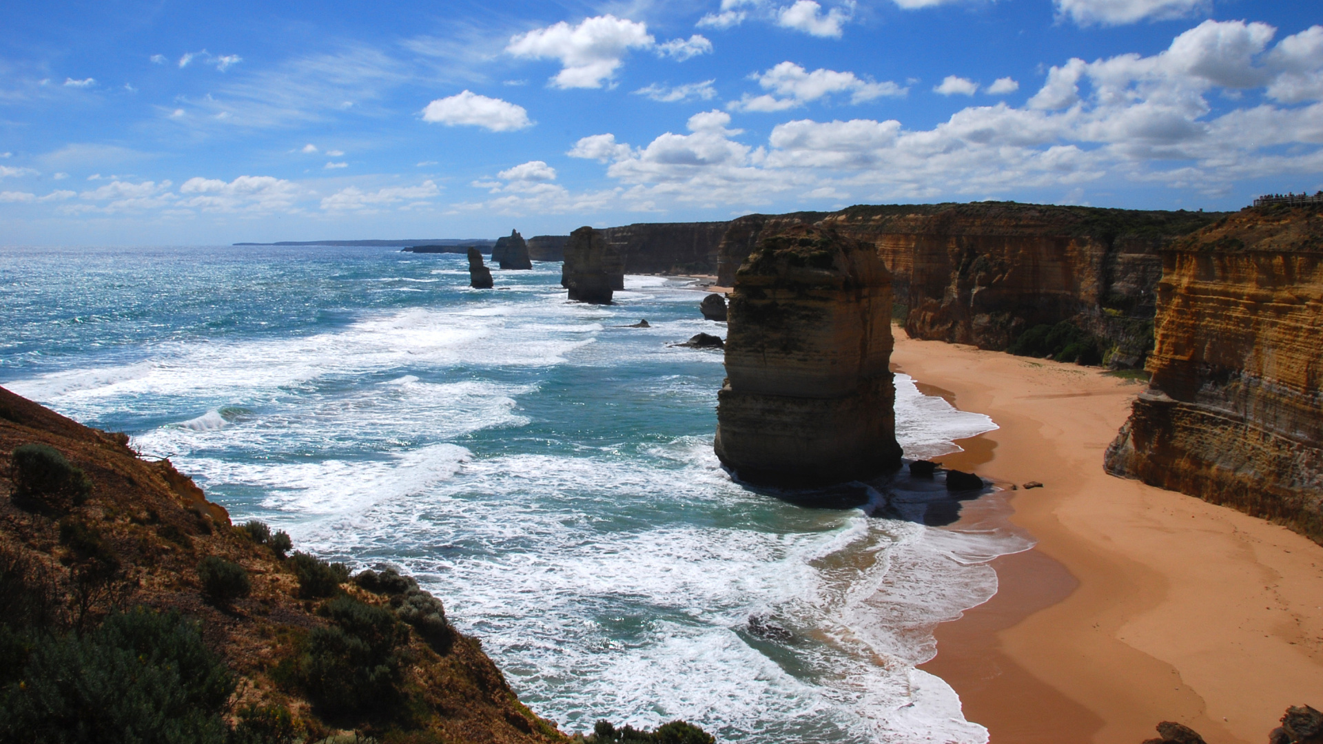 Brown Rock Formation on Sea Shore During Daytime. Wallpaper in 1920x1080 Resolution