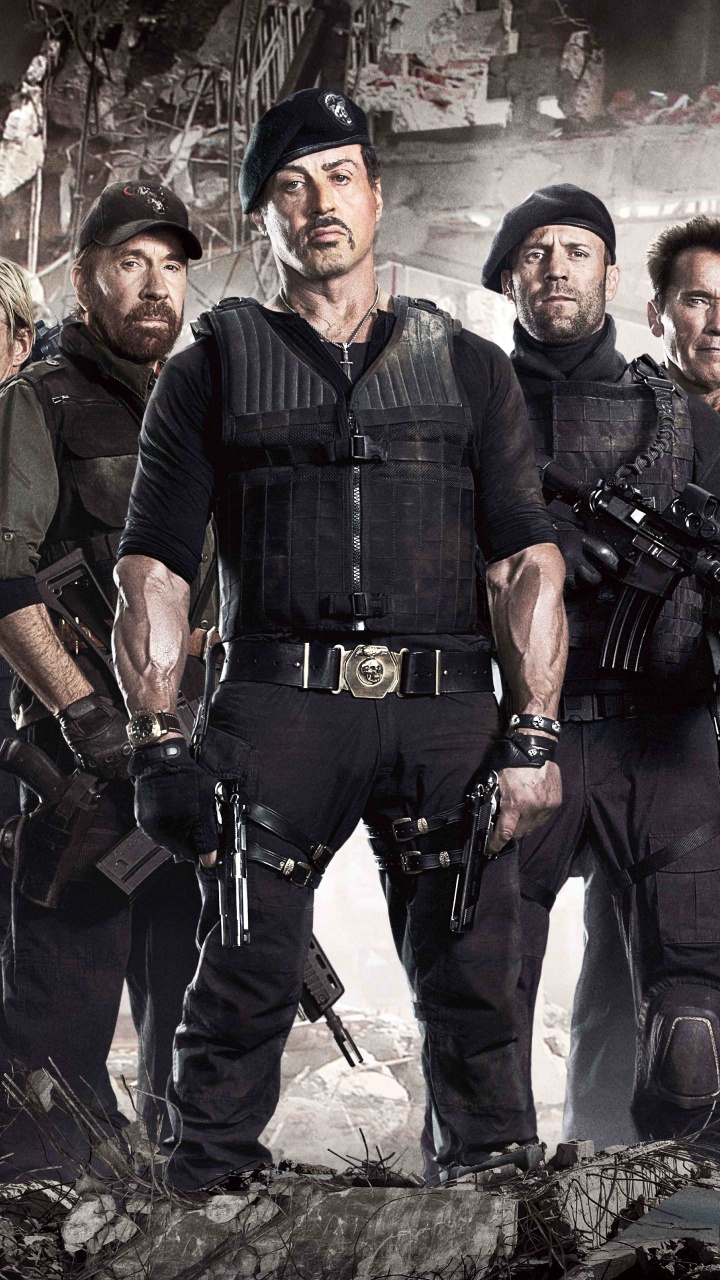 Gruppe Von Männern in Schwarzer Uniform, Die Auf Felsigem Boden Steht. Wallpaper in 720x1280 Resolution