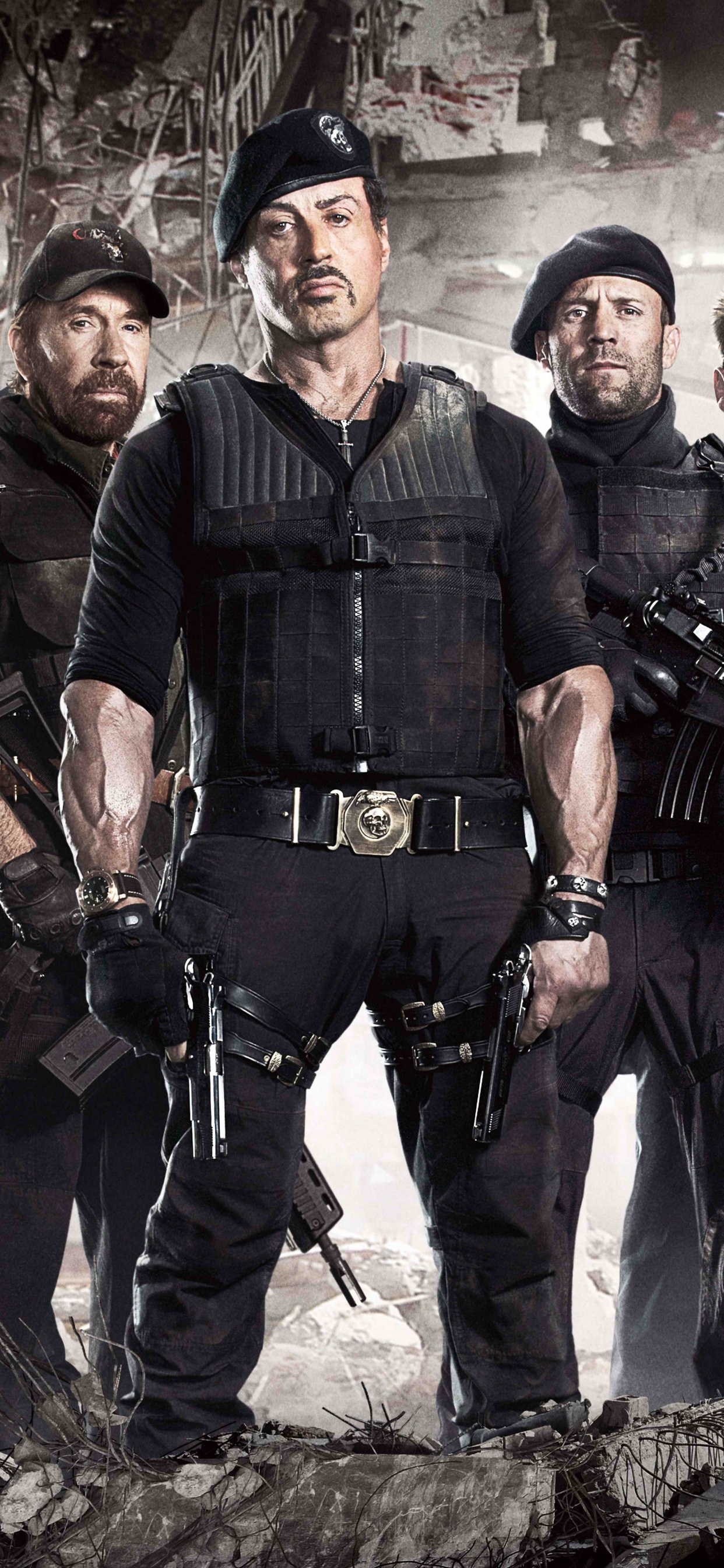 Groupe D'hommes en Uniforme Noir Debout Sur un Sol Rocheux. Wallpaper in 1242x2688 Resolution