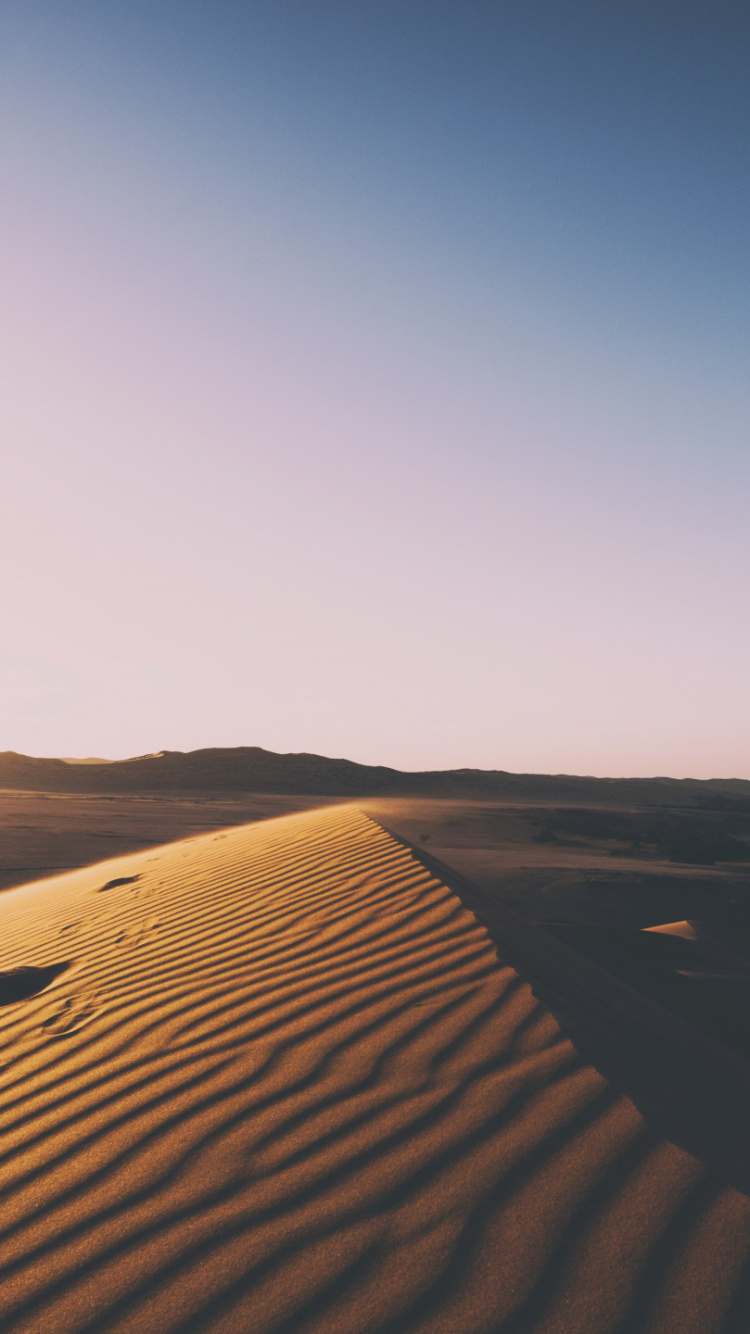 Brown Sand Dunes During Daytime. Wallpaper in 750x1334 Resolution