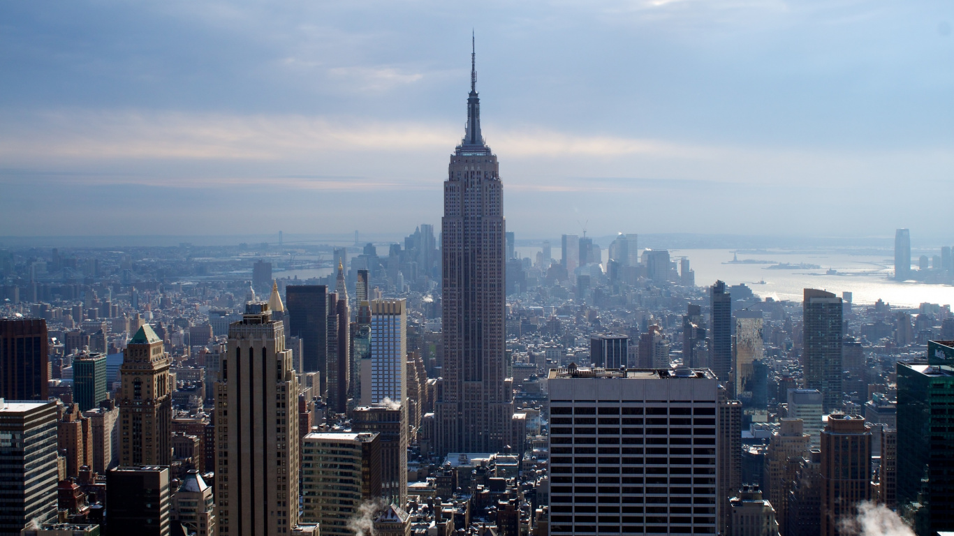 City Skyline Under Blue Sky During Daytime. Wallpaper in 1366x768 Resolution