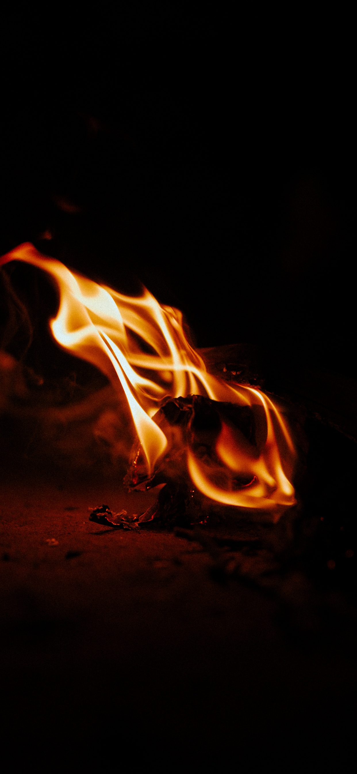 Fire in The Dark During Night Time. Wallpaper in 1242x2688 Resolution