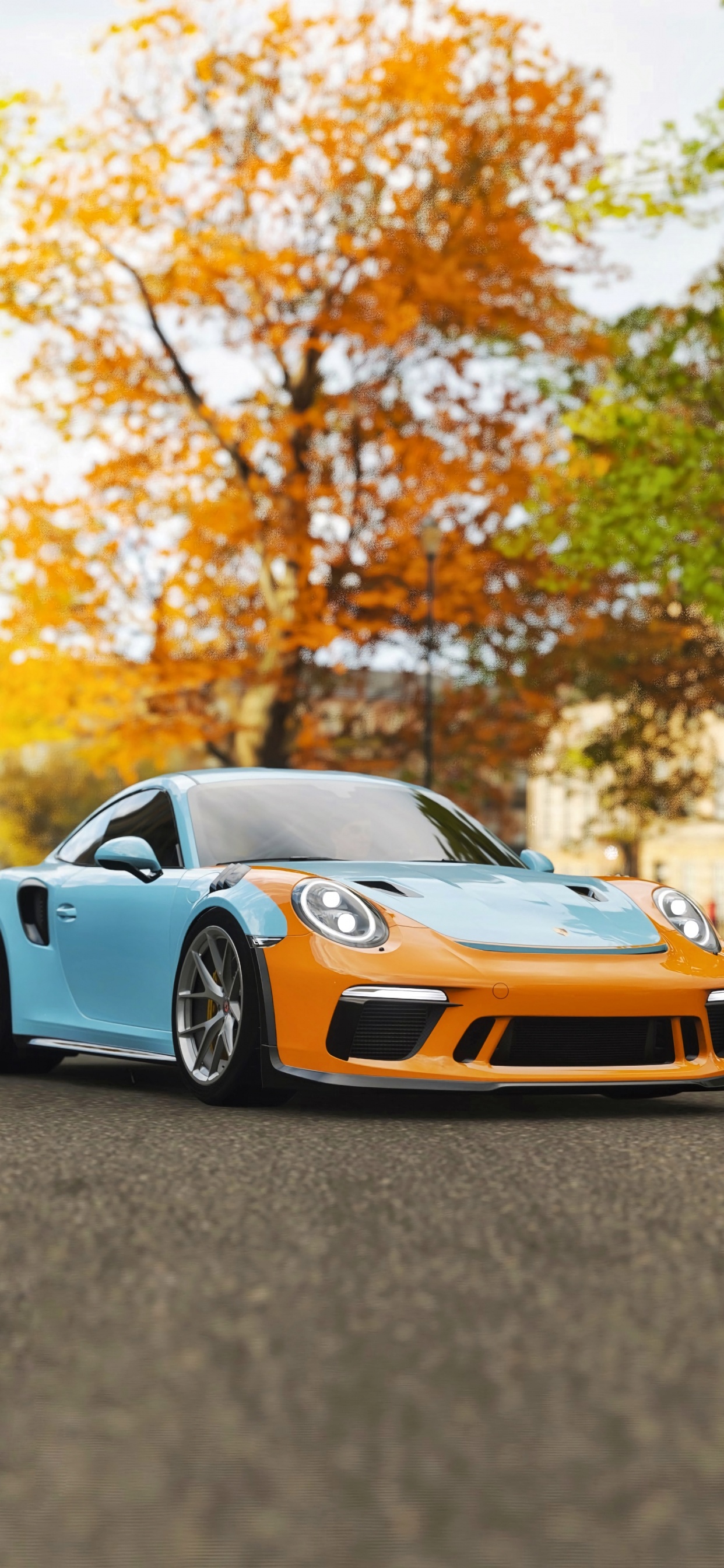 Lamborghini Aventador Bleue Garée Sur Une Route Goudronnée Grise Pendant la Journée. Wallpaper in 1242x2688 Resolution