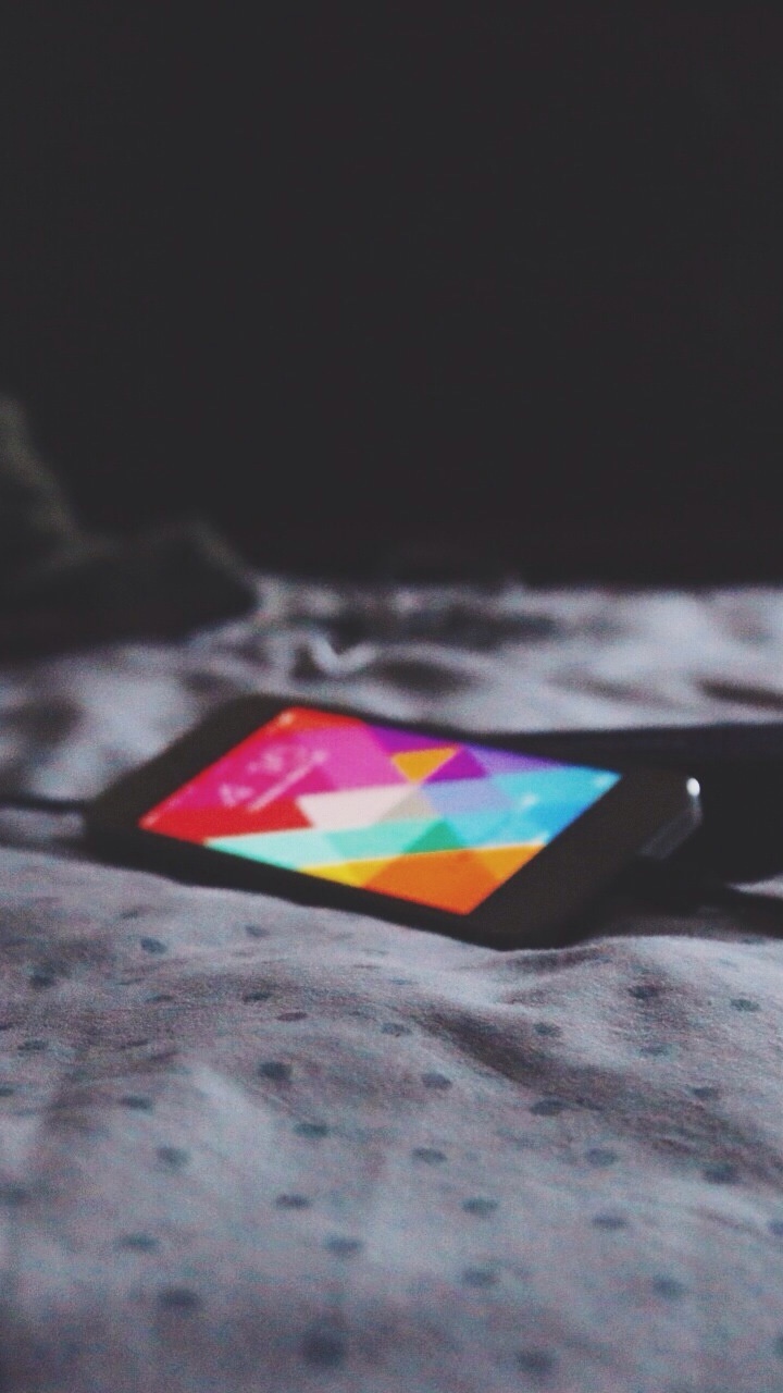 Black and Red Labeled Book on White Bed Linen. Wallpaper in 720x1280 Resolution