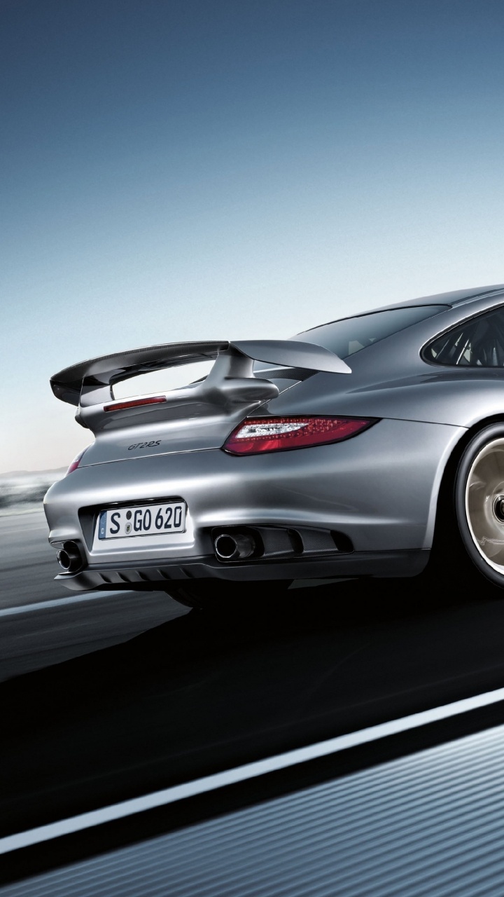Silver Porsche 911 on Gray Asphalt Road. Wallpaper in 720x1280 Resolution