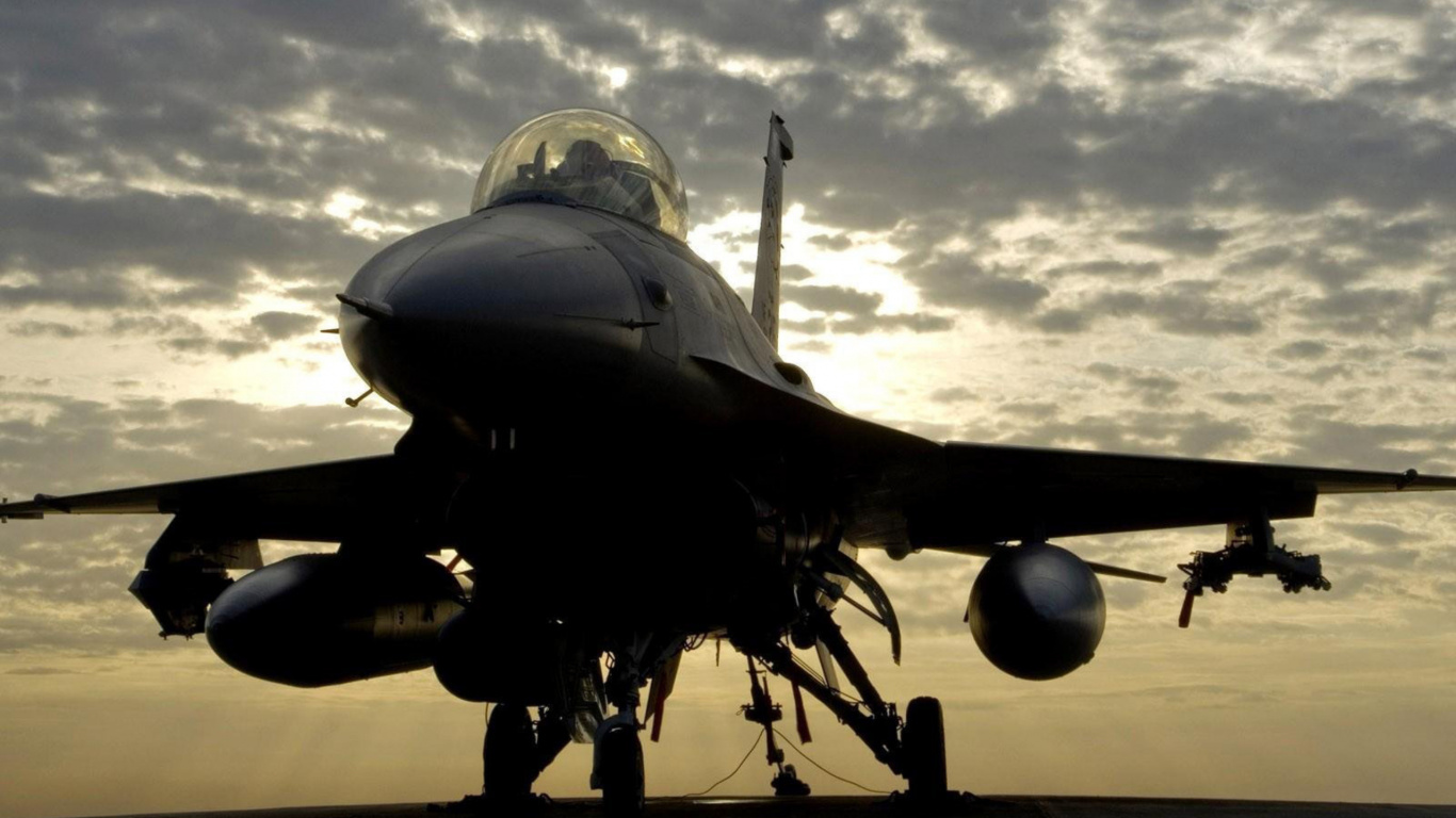 Black Fighter Plane Under White Clouds During Daytime. Wallpaper in 1366x768 Resolution