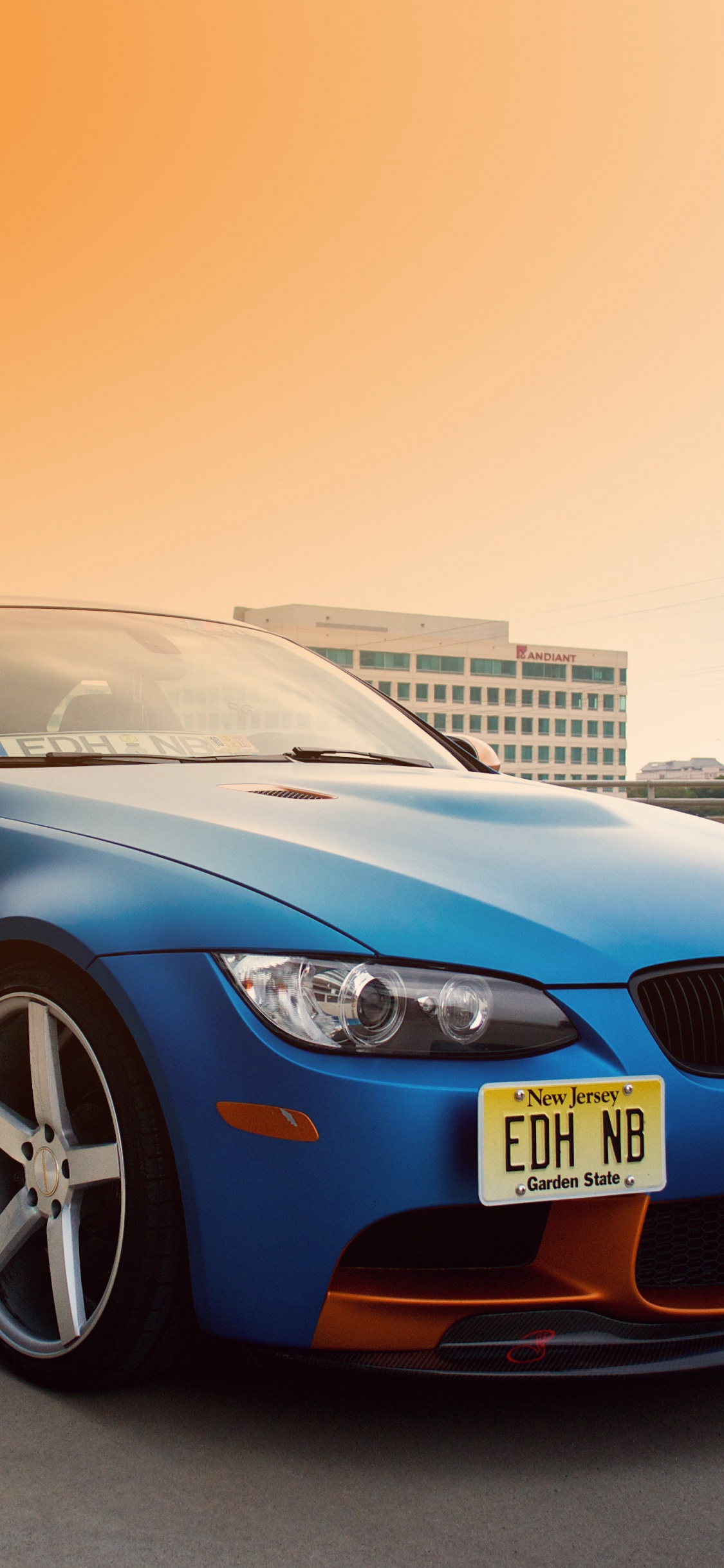 Blue Bmw m 3 Coupe Parked on Gray Concrete Pavement During Daytime. Wallpaper in 1125x2436 Resolution