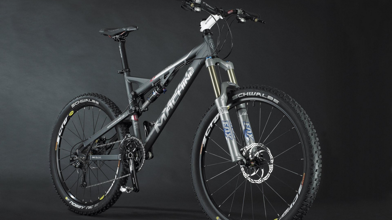 Gelbes Und Schwarzes Mountainbike. Wallpaper in 1366x768 Resolution