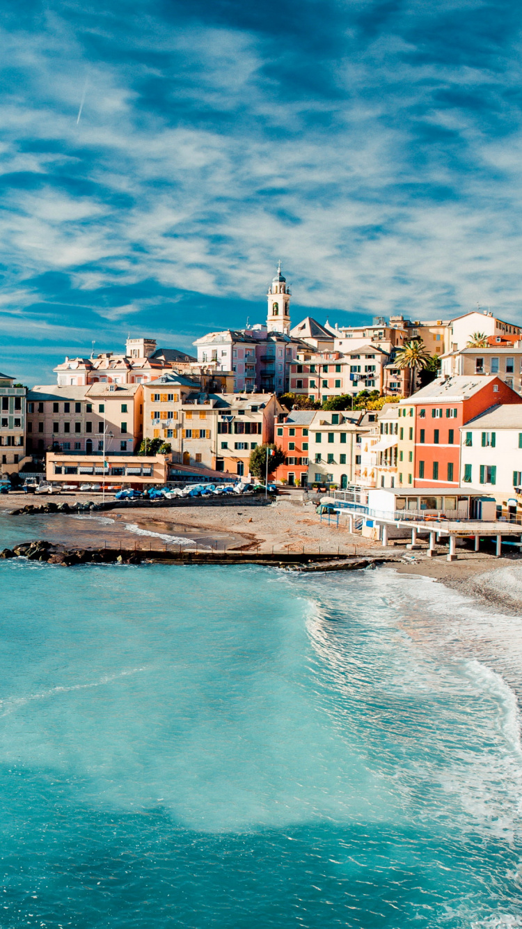 Weißes Und Braunes Betongebäude in Der Nähe Von Gewässern Unter Blauem Himmel Tagsüber. Wallpaper in 750x1334 Resolution