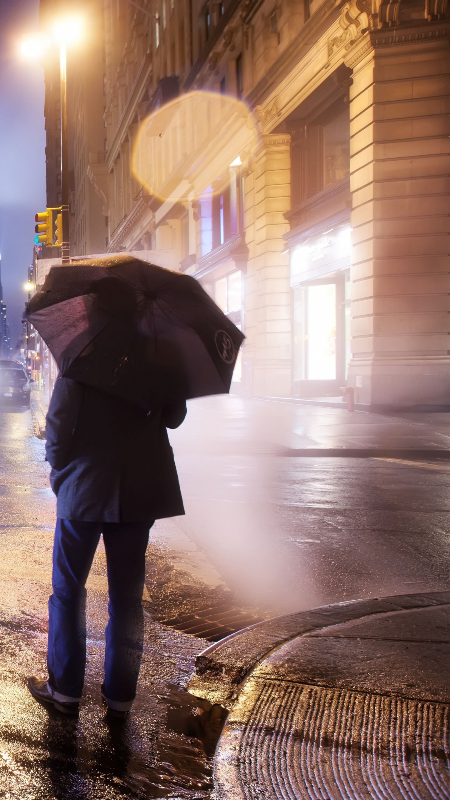 Person Walking on Sidewalk During Night Time. Wallpaper in 1440x2560 Resolution