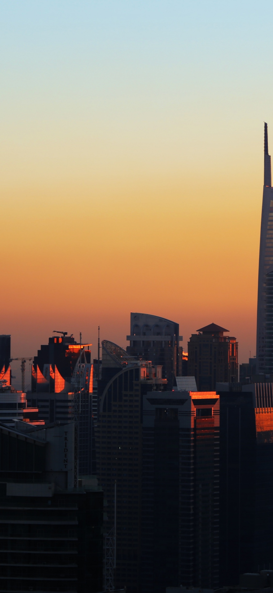 High Rise Buildings During Sunset. Wallpaper in 1125x2436 Resolution