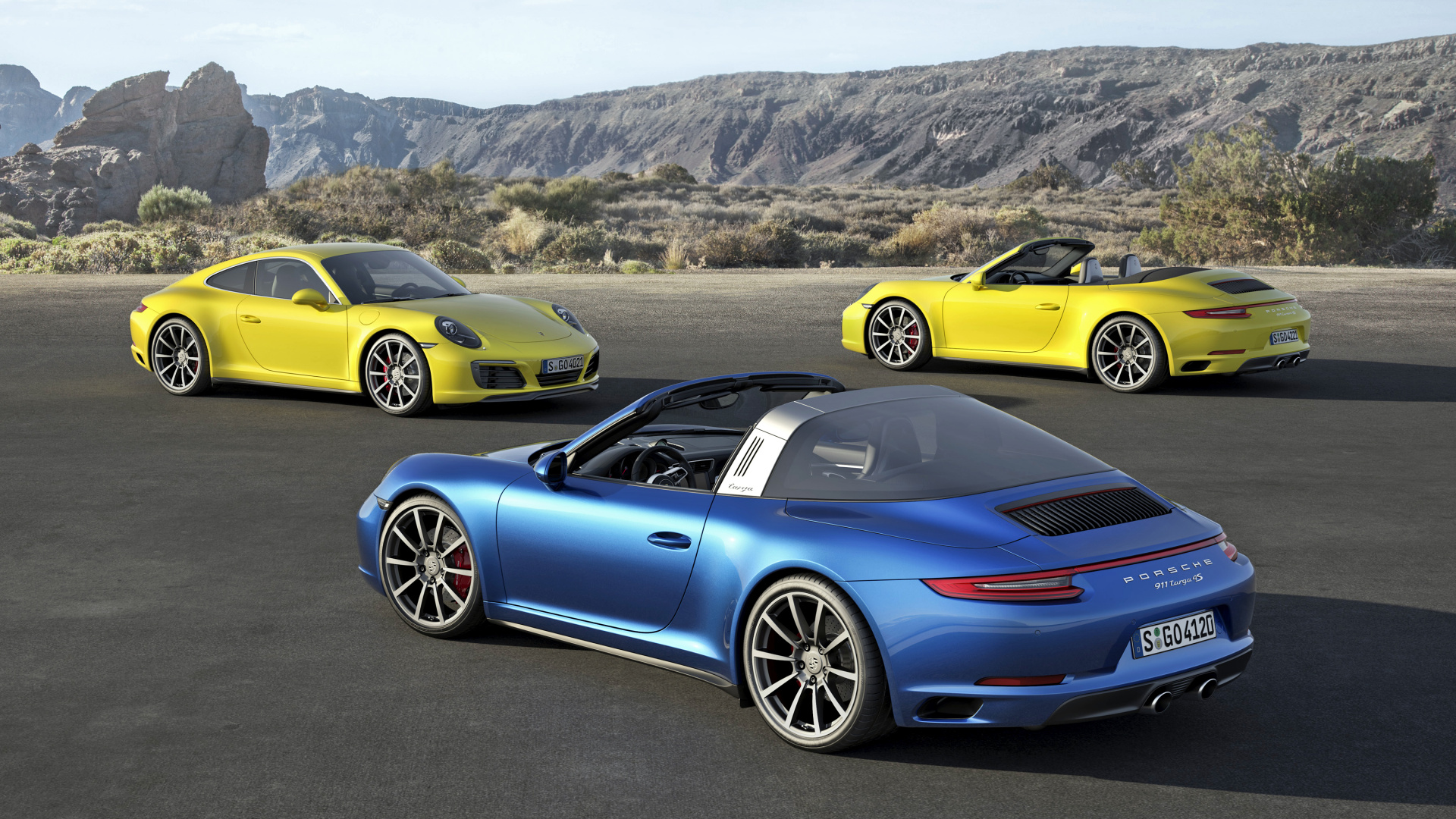 Yellow and Blue Porsche 911 on Road During Daytime. Wallpaper in 1920x1080 Resolution
