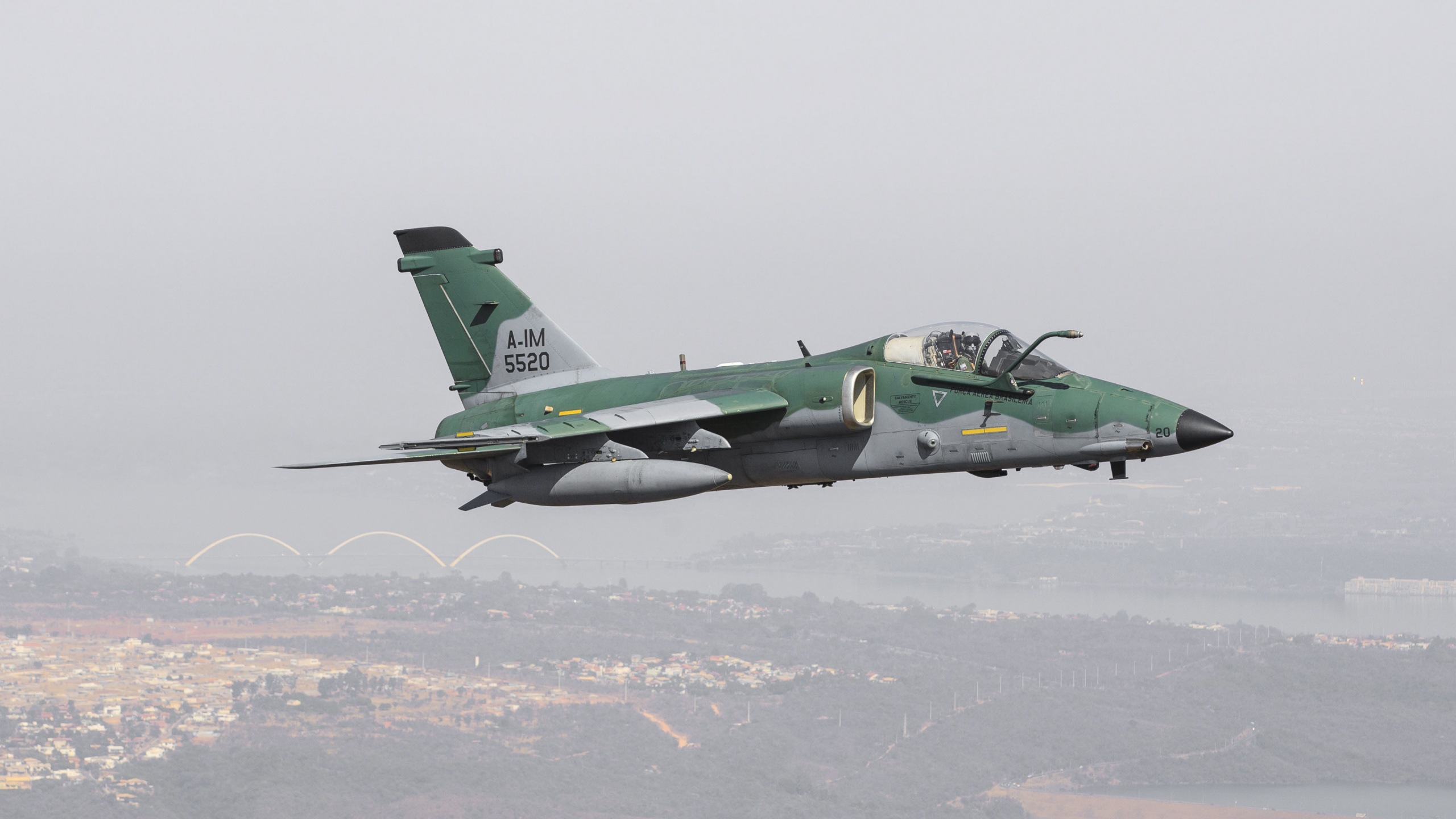 Green and Black Jet Plane Flying Over The White Clouds During Daytime. Wallpaper in 2560x1440 Resolution