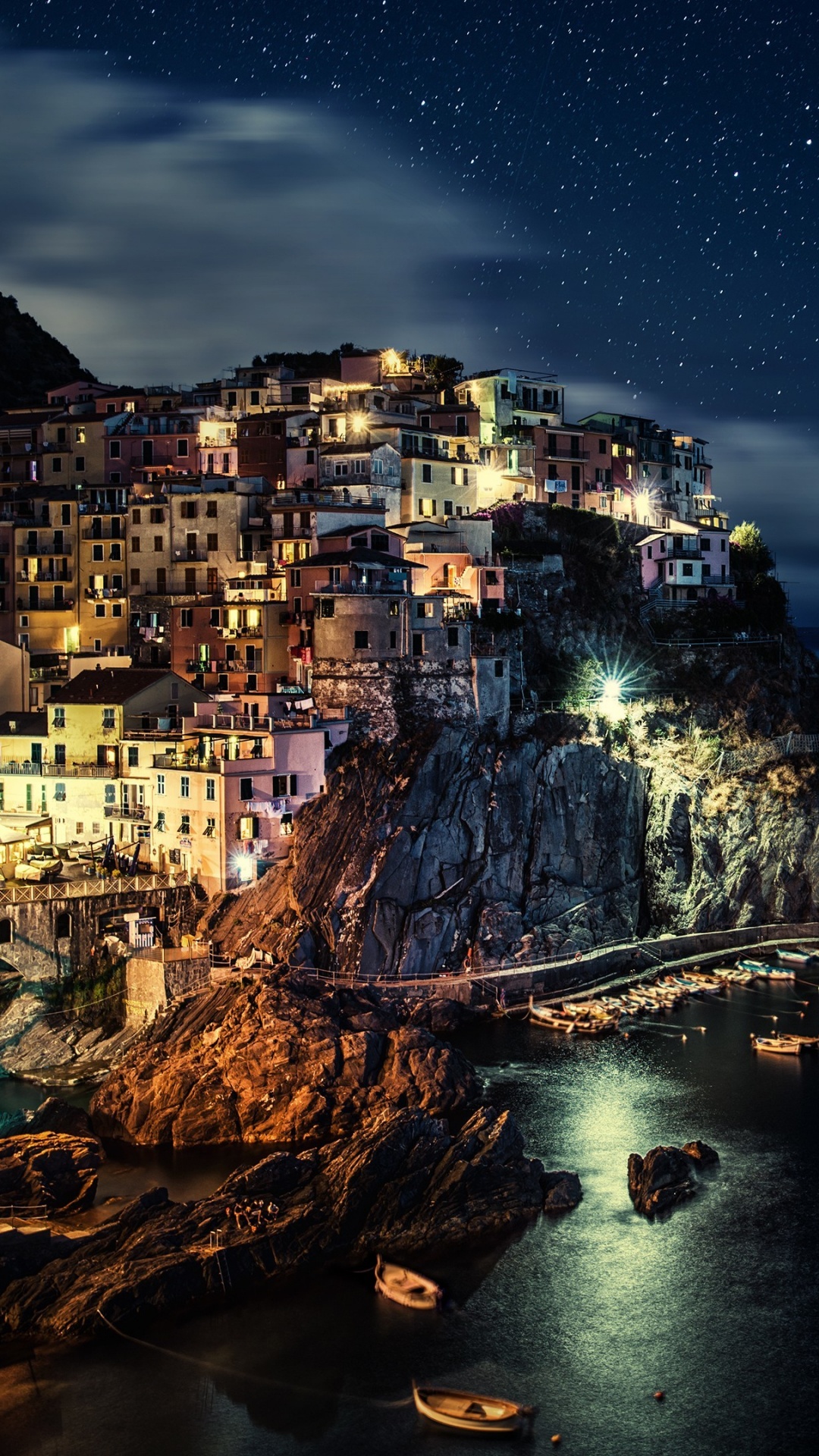 City Buildings Near Body of Water During Night Time. Wallpaper in 1080x1920 Resolution