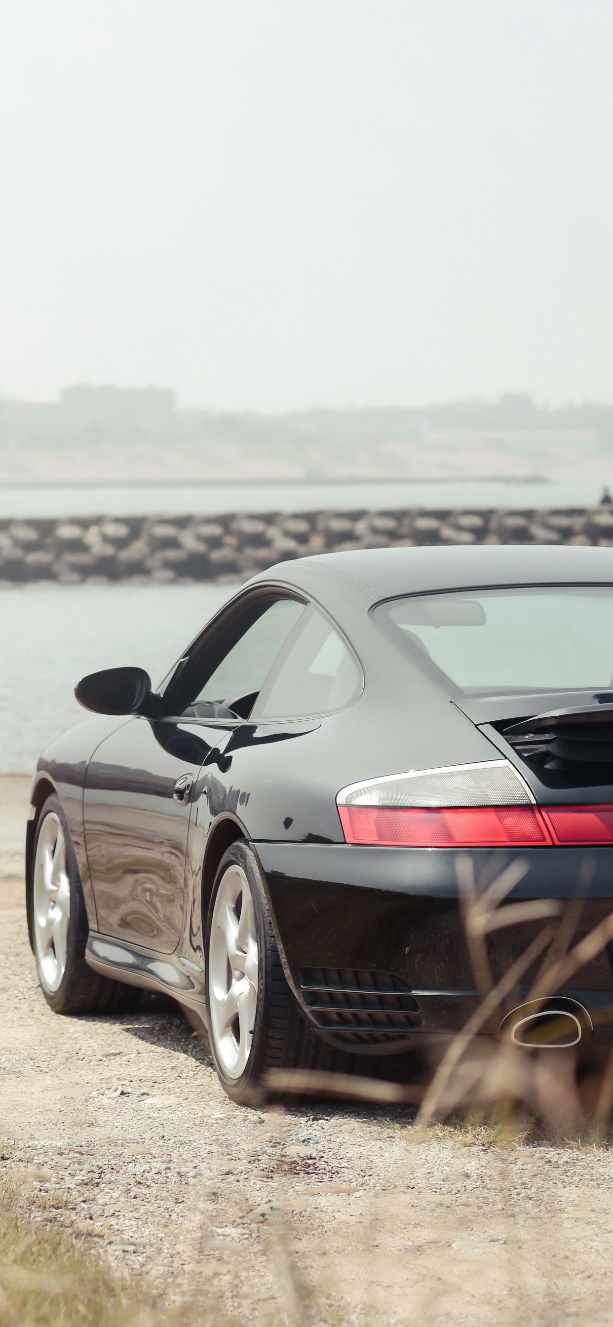 Black Bmw m 3 Coupe on Seashore During Daytime. Wallpaper in 1242x2688 Resolution