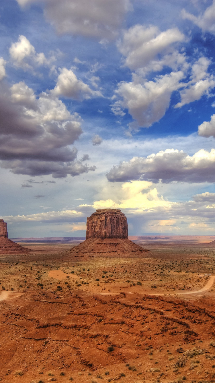 Brown Sand Under White Clouds and Blue Sky During Daytime. Wallpaper in 750x1334 Resolution
