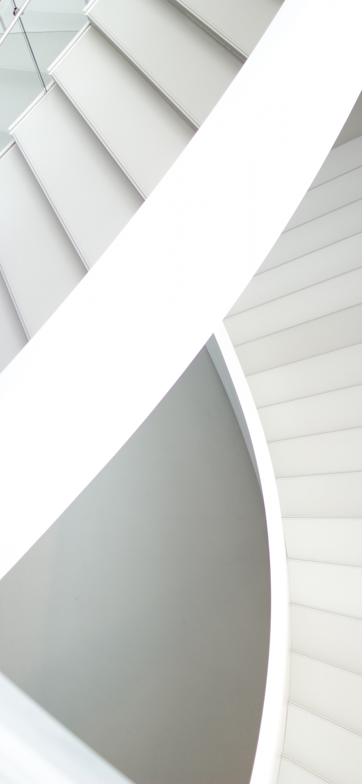 White Concrete Spiral Staircase During Daytime. Wallpaper in 1242x2688 Resolution