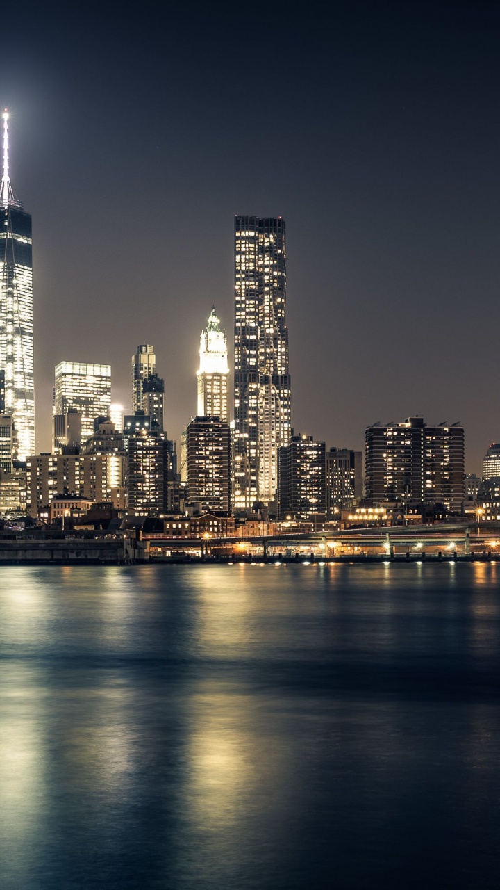 City Skyline During Night Time. Wallpaper in 720x1280 Resolution