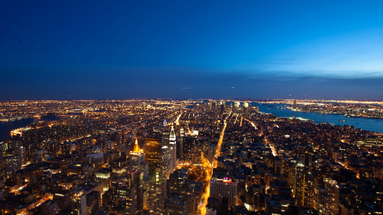 Aerial View of City Buildings During Night Time. Wallpaper in 1280x720 Resolution