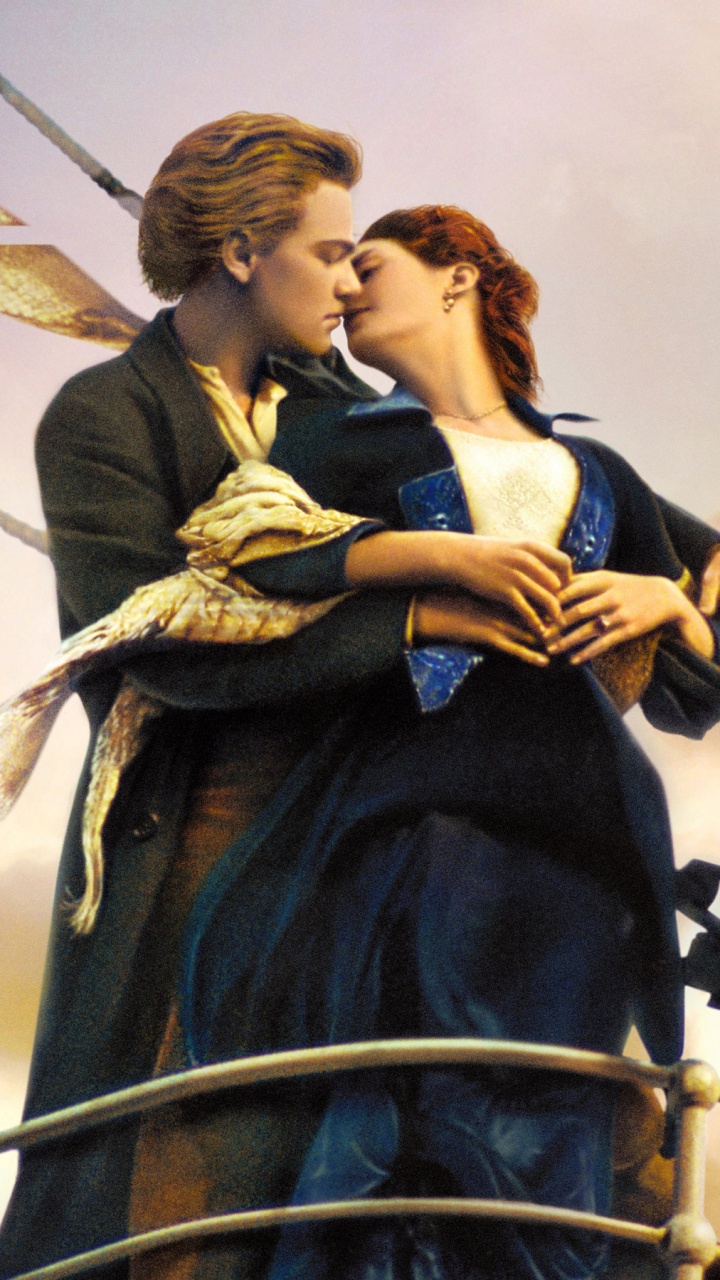 Frau im Schwarzen Kleid Mit Mann im Schwarzen Anzug. Wallpaper in 720x1280 Resolution