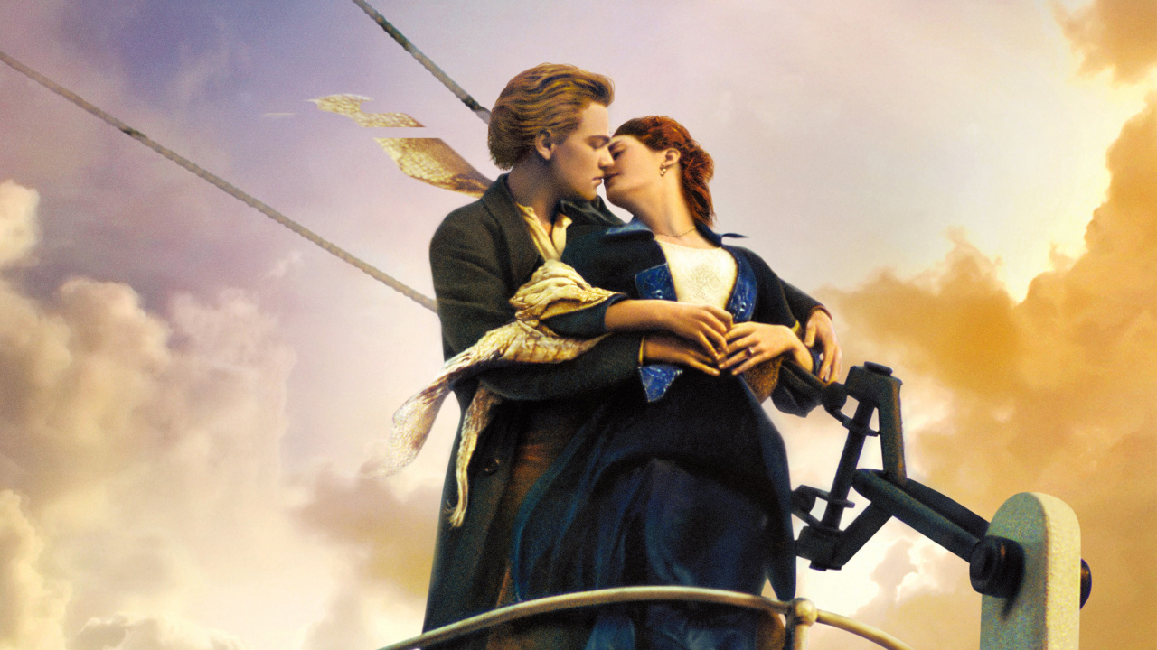 Woman in Black Dress Holding Man in Black Suit. Wallpaper in 1280x720 Resolution