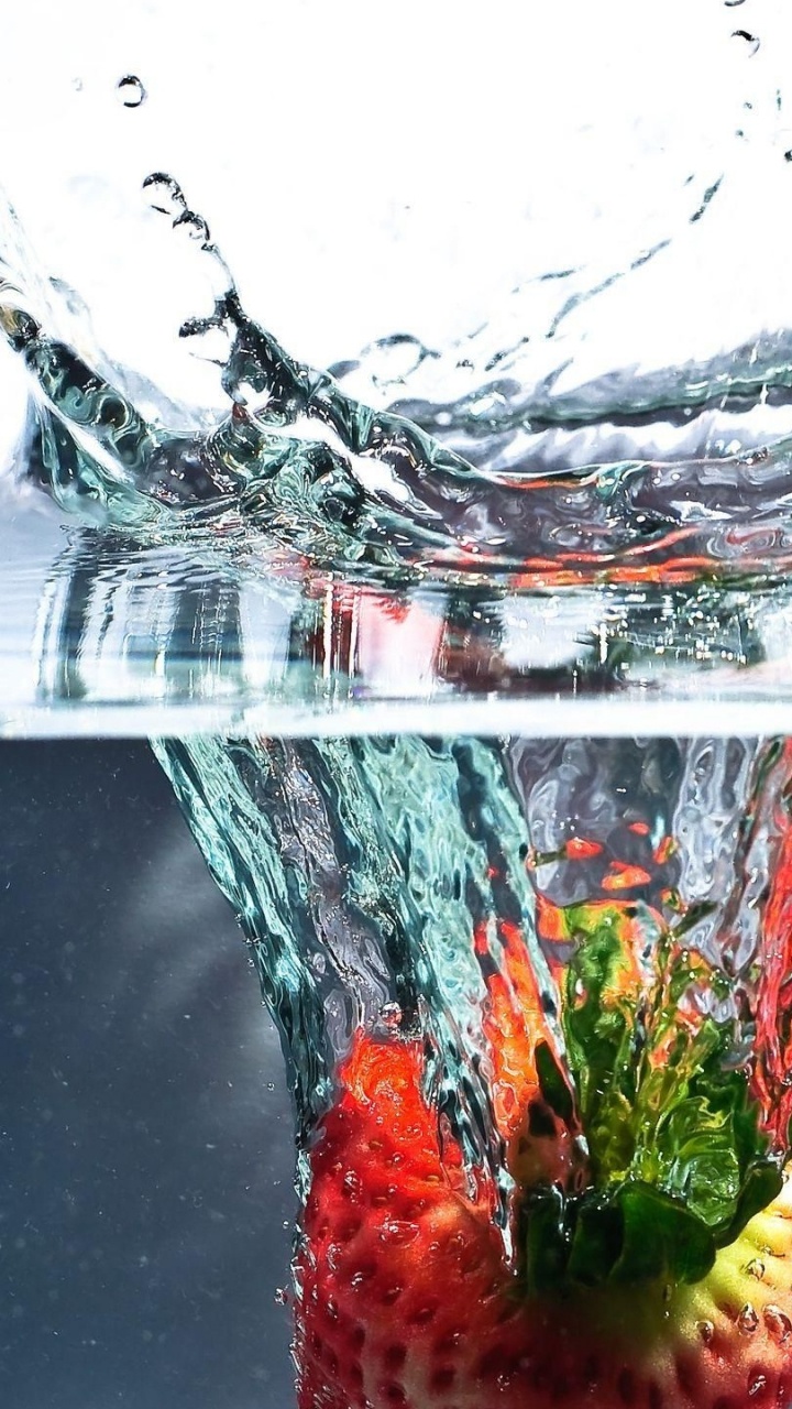 Red Strawberries in Clear Glass Container. Wallpaper in 720x1280 Resolution