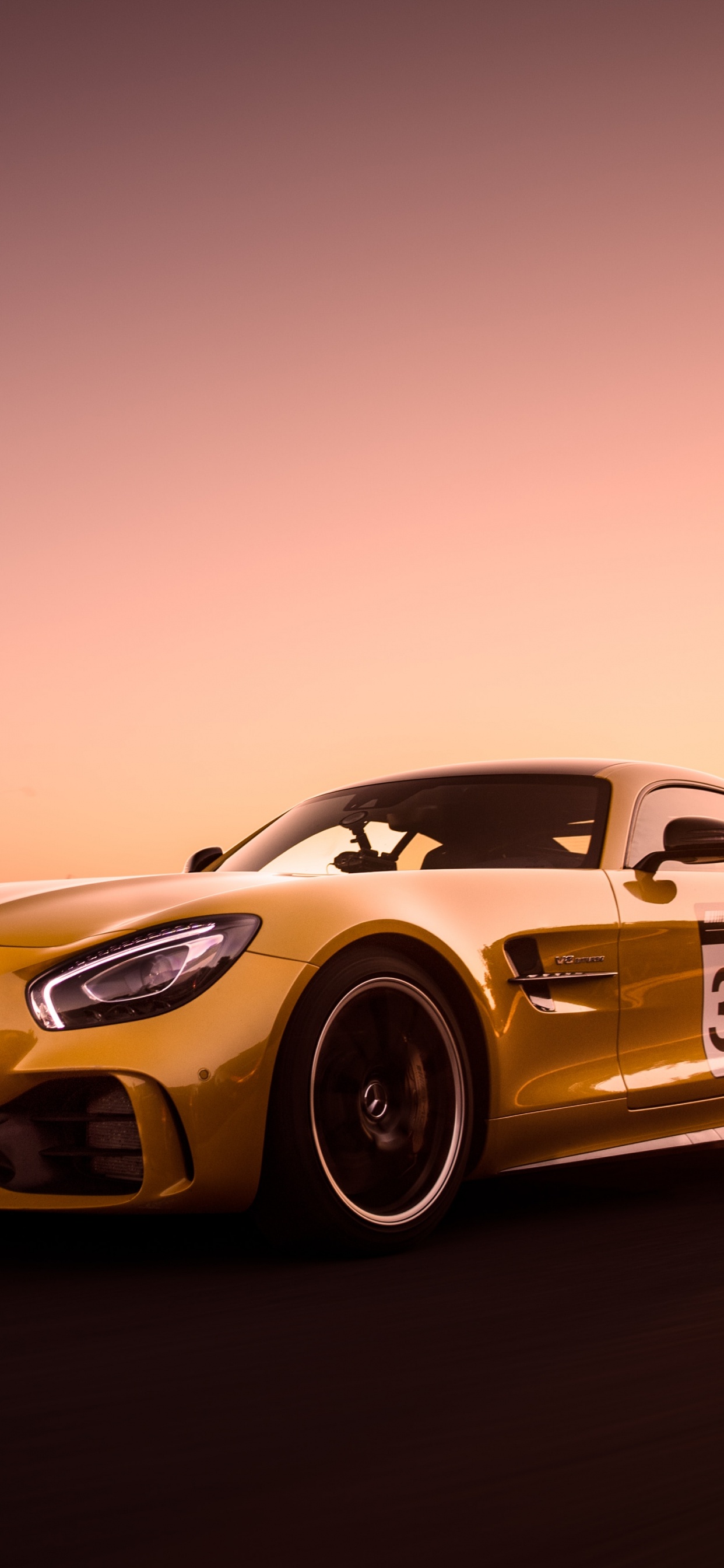 Yellow and Black Bmw m 3 Coupe on Road. Wallpaper in 1242x2688 Resolution