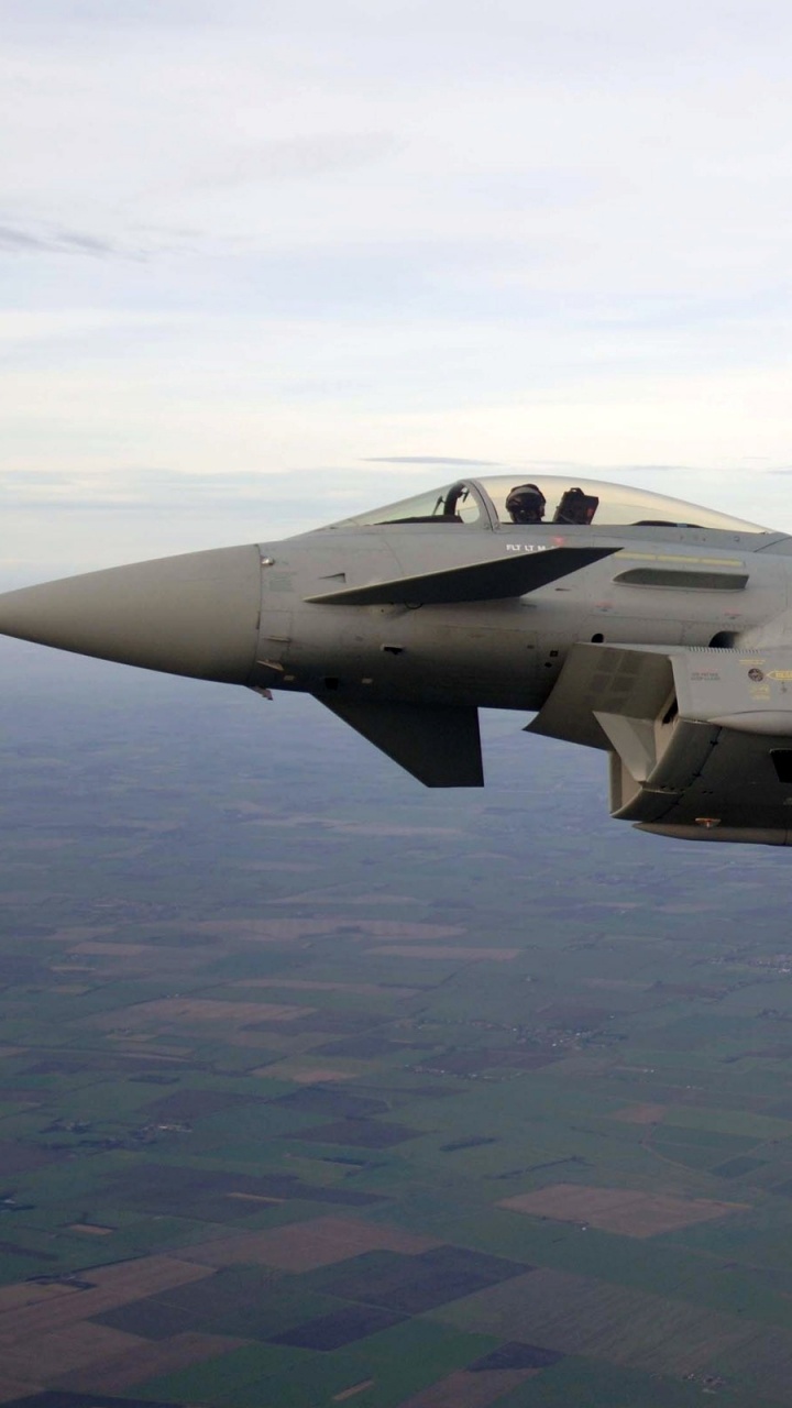 Gray Fighter Jet Flying Over The Sky During Daytime. Wallpaper in 720x1280 Resolution