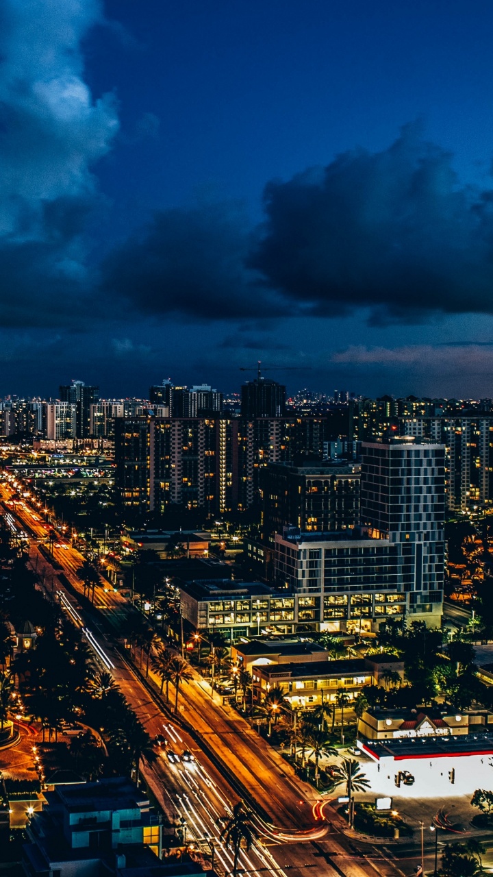 City Skyline During Night Time. Wallpaper in 720x1280 Resolution