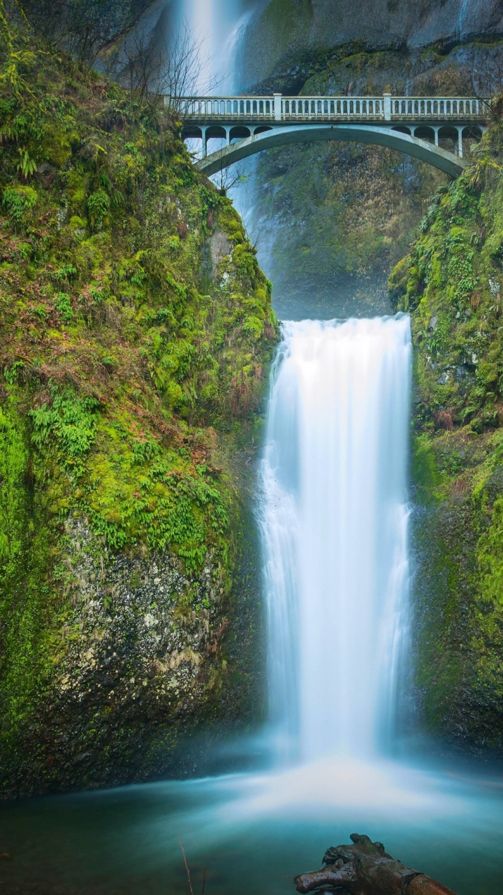 Waterfalls Under Bridge During Daytime. Wallpaper in 720x1280 Resolution