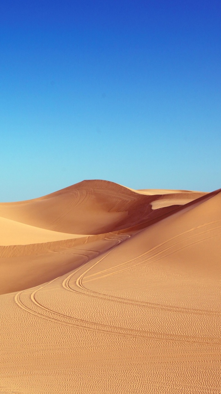 Brown Sand Under Blue Sky During Daytime. Wallpaper in 720x1280 Resolution