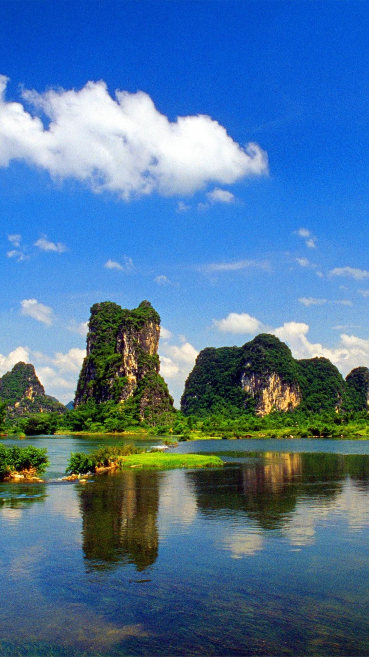 Green Trees Near Lake Under Blue Sky and White Clouds During Daytime. Wallpaper in 720x1280 Resolution